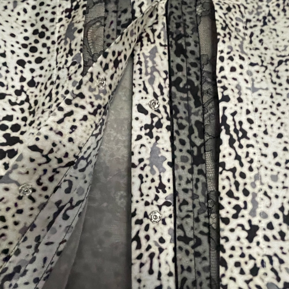 J Mendel black & white blouse, mixed pattern silk panels with lace accent.